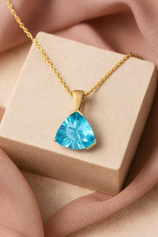 9K Yellow Gold Pendant With Blue Topaz