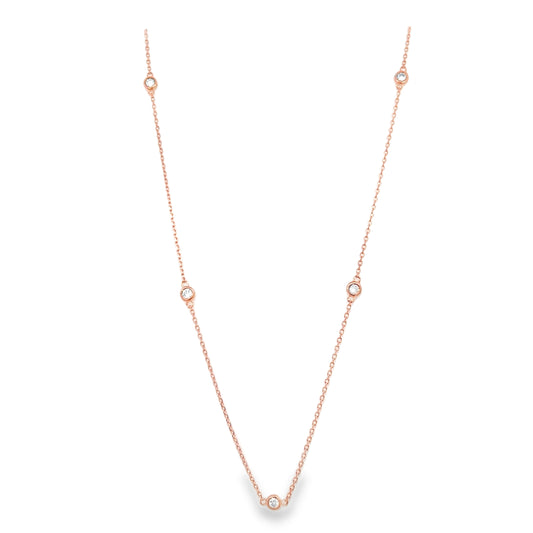 Rose gold necklace on a white background