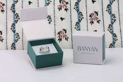 Blue and White Topaz Silver Ring