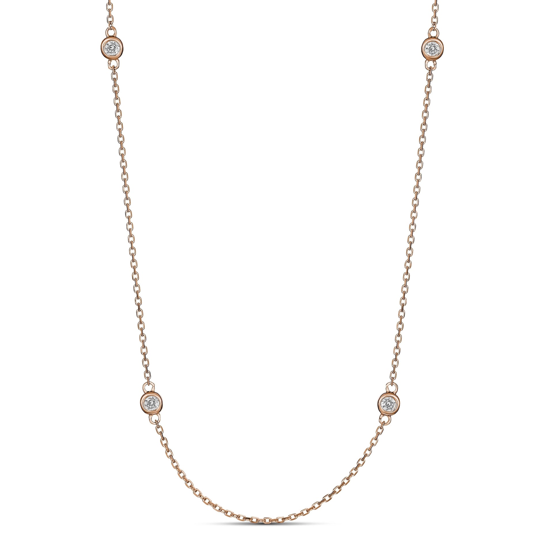 A 9ct rose gold necklace with bezel set diamonds along the chain, displayed on a white background.