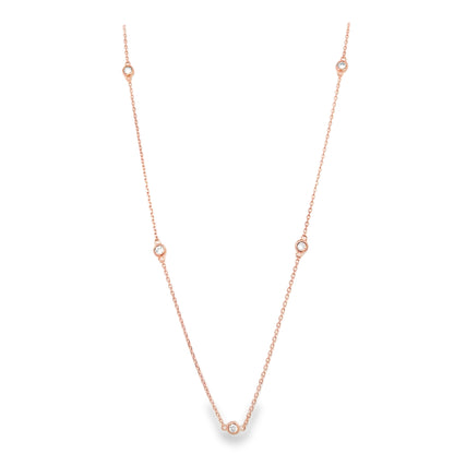 Rose gold necklace on a white background
