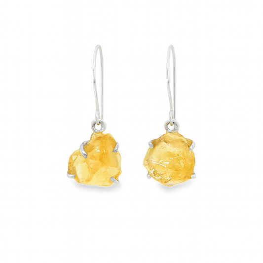 Pair of citrine stone earrings on a white background